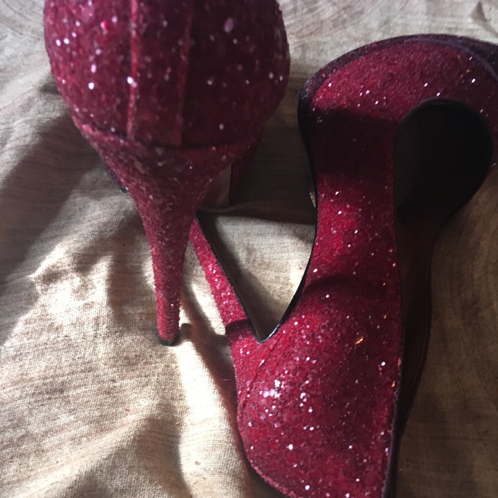 Schutz red glittery pumps